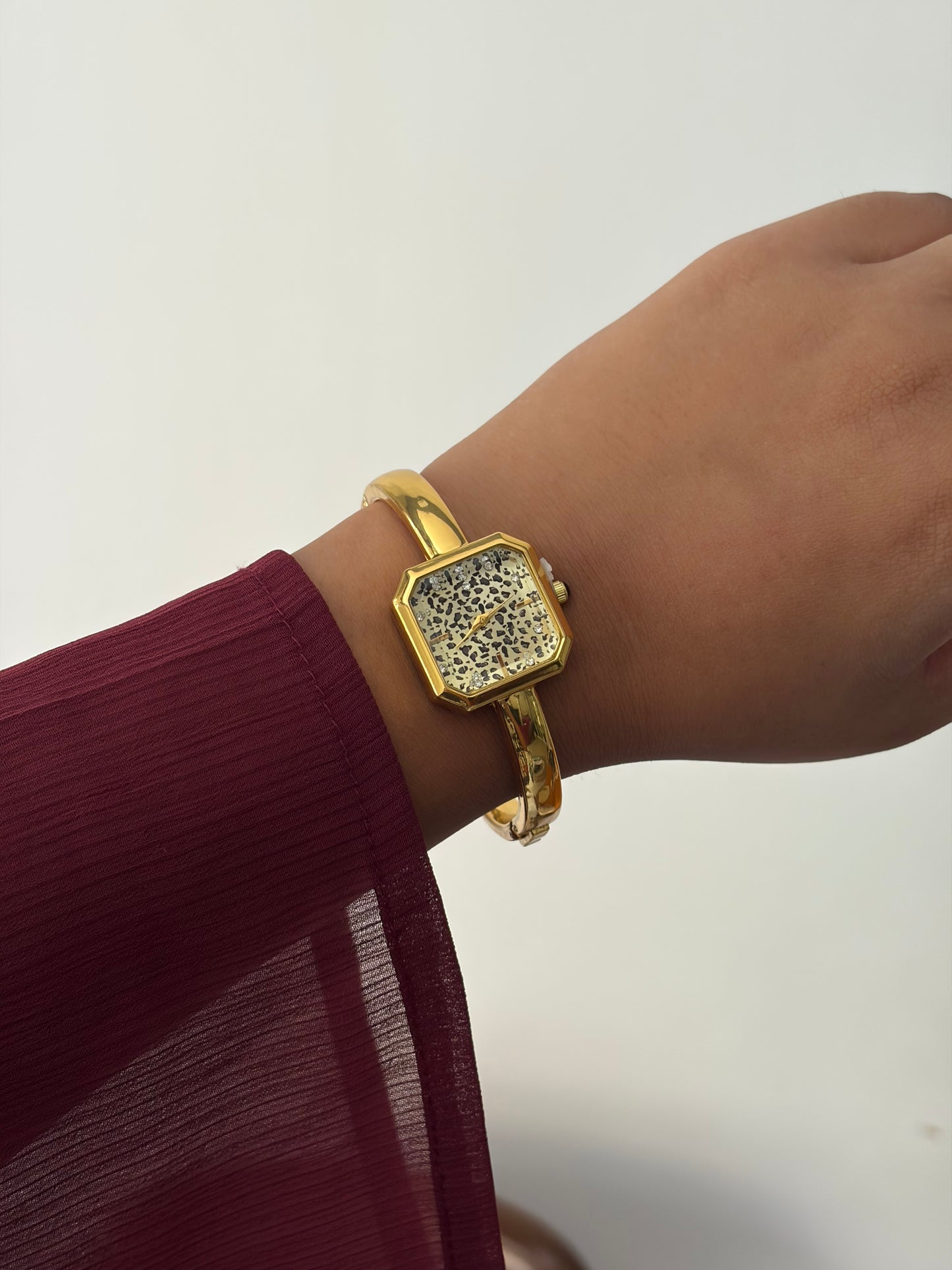 Becca print bangle watch